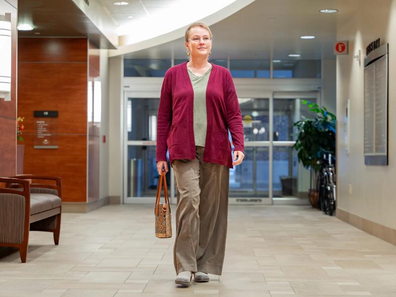 Photos of Dr. Sahni patient Kim and team performing orthopedic shoulder nurse navigator meet for infusion at WellSpan Adams Cancer Center. For use in Macroscope Magazine #3.
