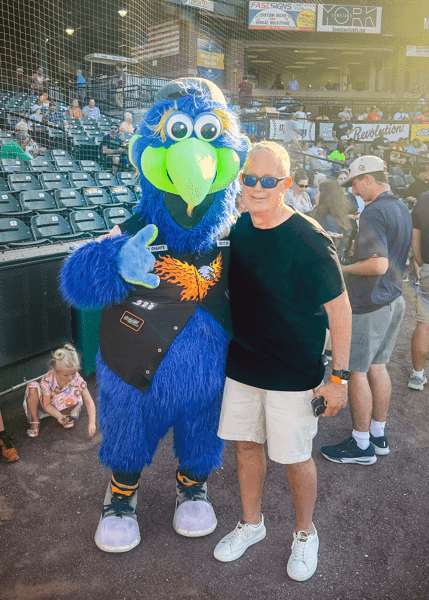 Photos form Heart & Vascular patient George Taylor at WellSpan Park York Revolution game throwing out first pitch.