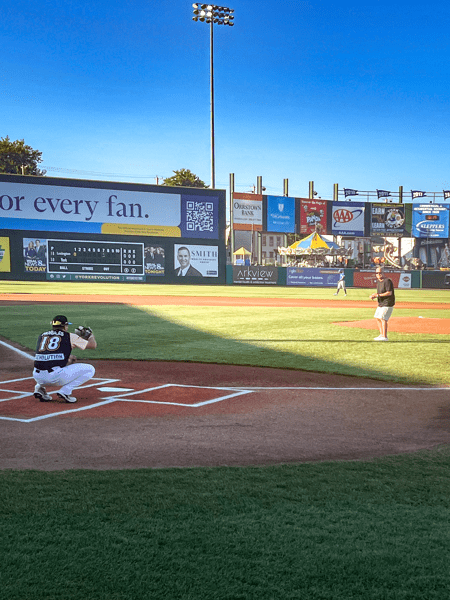Photos form Heart & Vascular patient George Taylor at WellSpan Park York Revolution game throwing out first pitch.