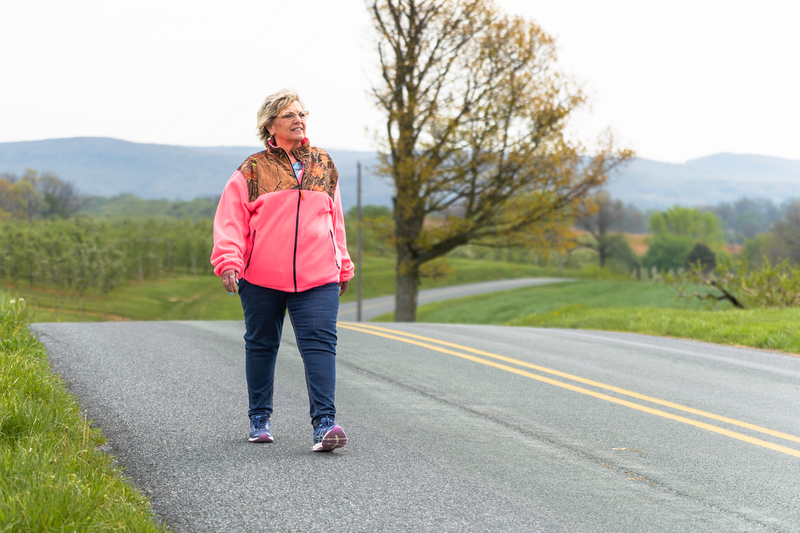 Photos of patient Denise Flood walking after recent double knee replacement.