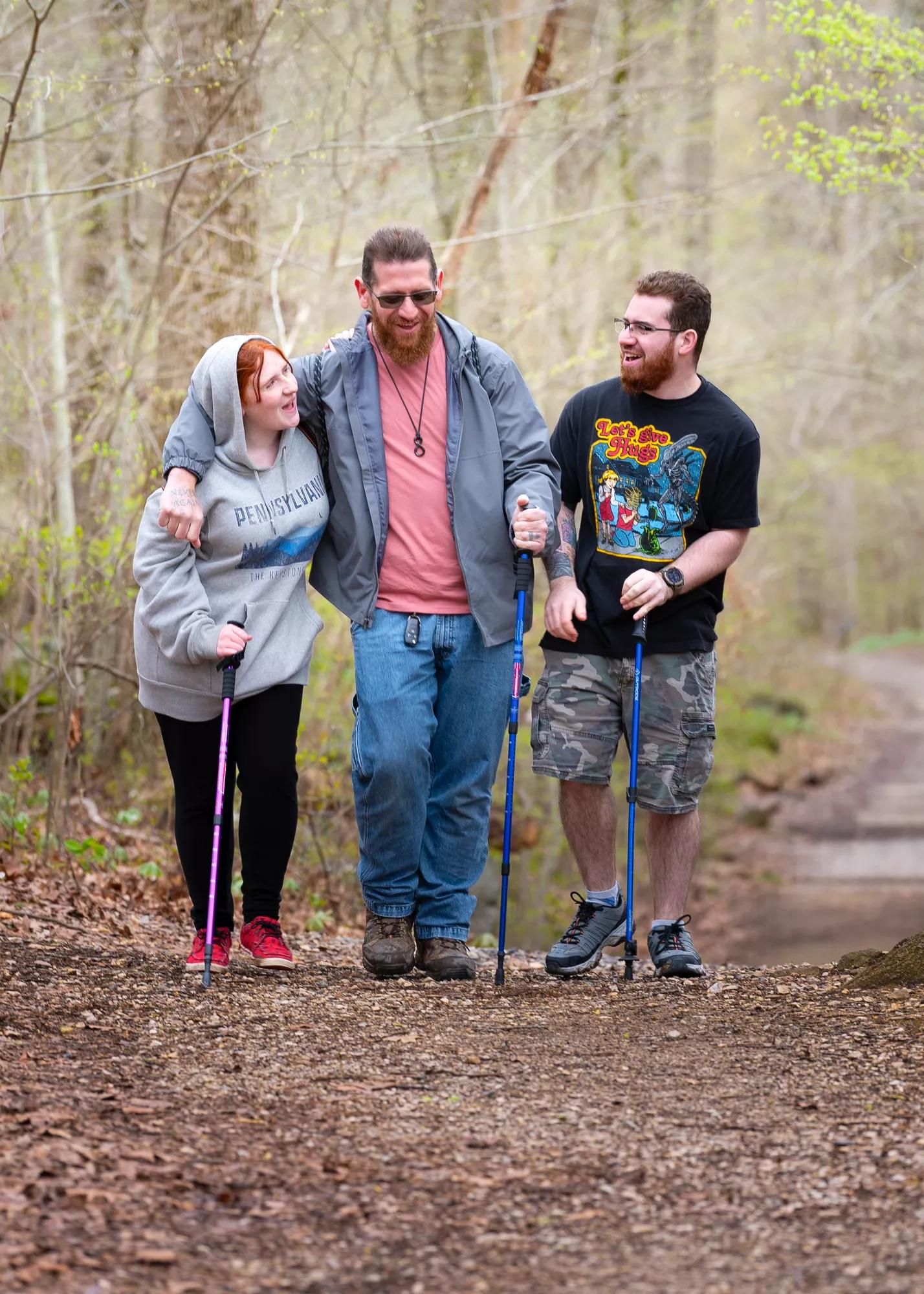 After photos of Bariatric Surgery patient Scott with his children hiking outdoors.